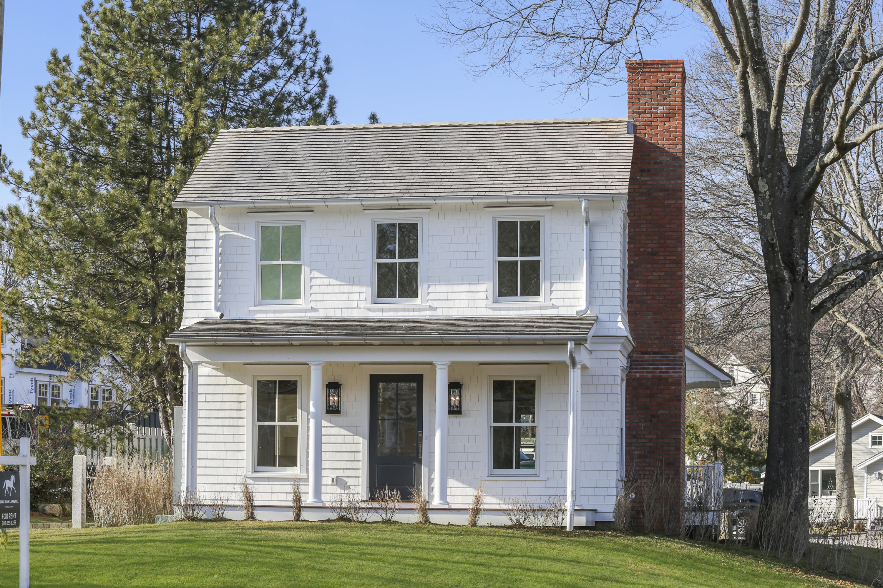 693 Post Road Darien, CT 06820 - Photo 3 of 41 a view of a house with a yard