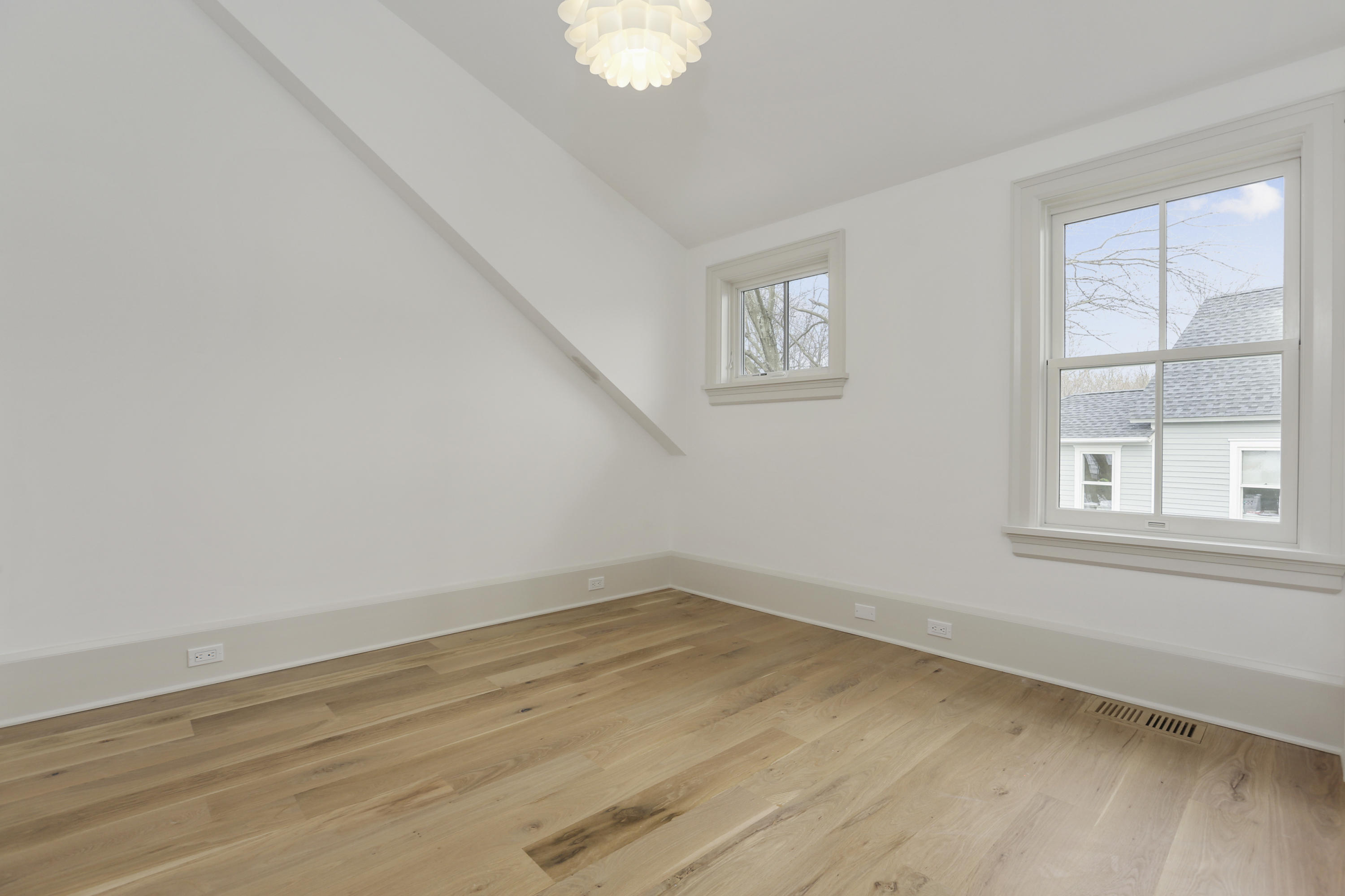 693 Post Road Darien, CT 06820 - Photo 21 of 41 an empty room with a window