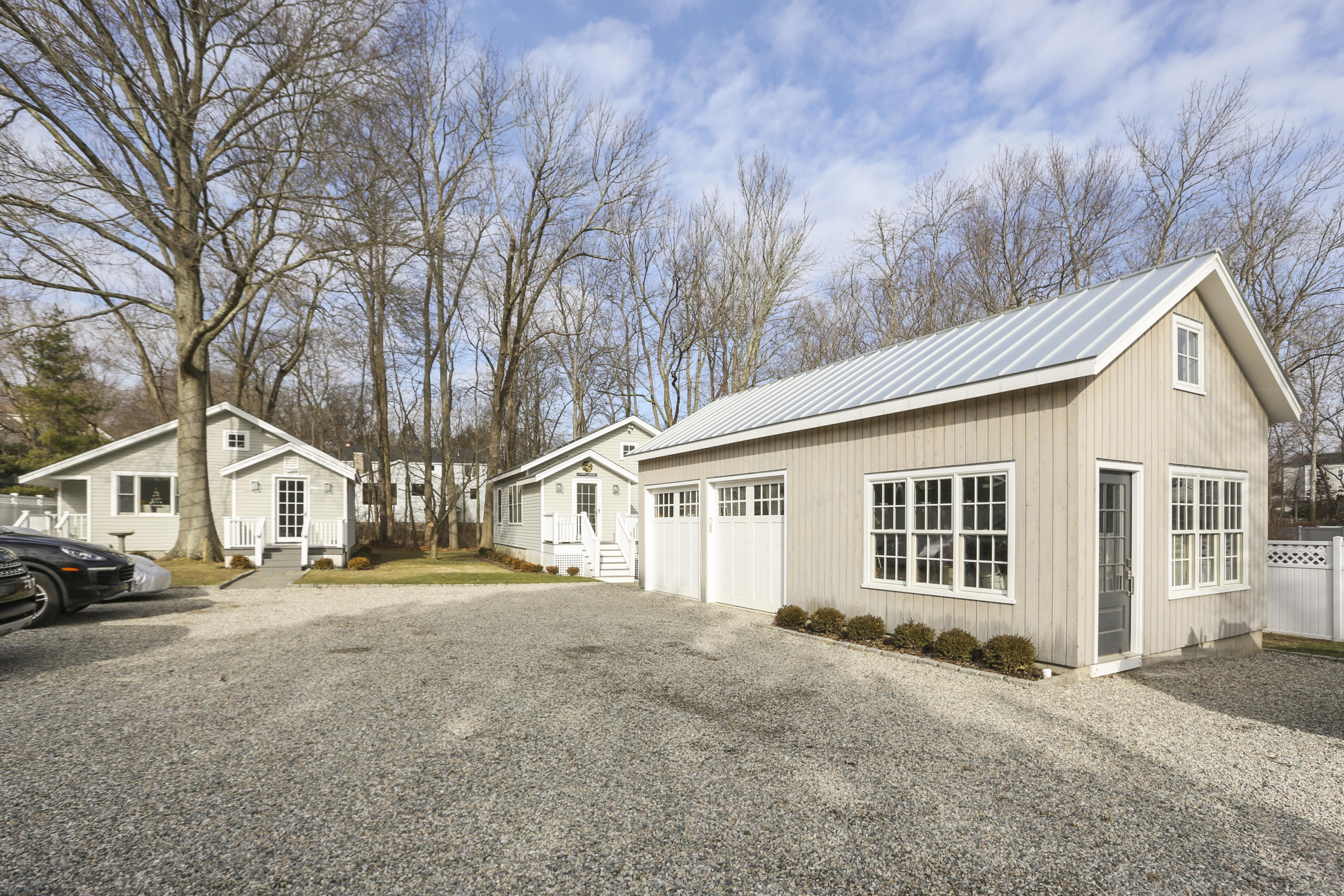 693 Post Road Darien, CT 06820 - Photo 26 of 41 a view of a house with a large space and a road