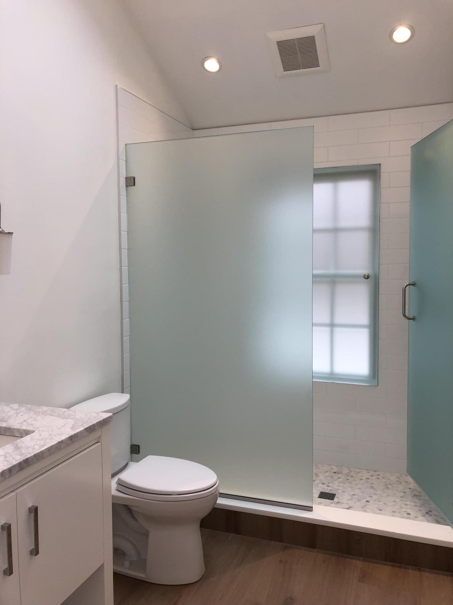 693 Post Road Darien, CT 06820 - Photo 35 of 41 a bathroom with a toilet sink and shower