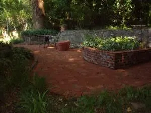a view of a backyard with sitting area