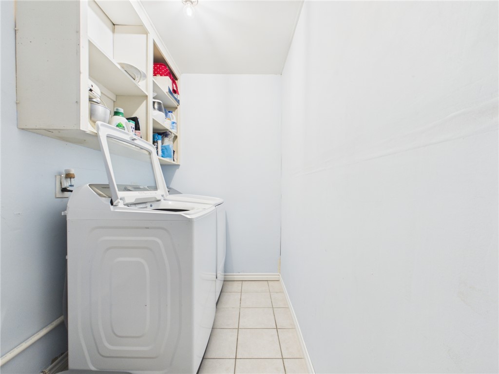 800 Rio Grande Lane Bryan, TX 77801 - Photo 17 of 23 a utility room with dryer and washer