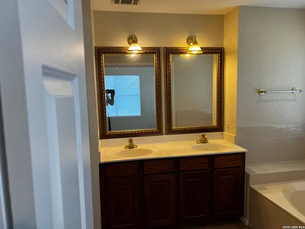 a bathroom with a toilet and a sink