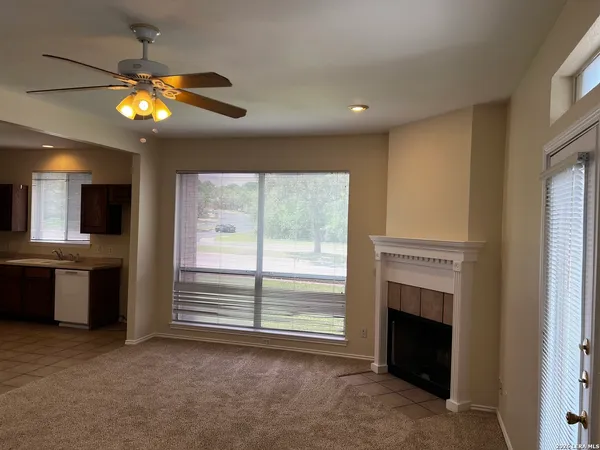 a view of a livingroom with a fireplace