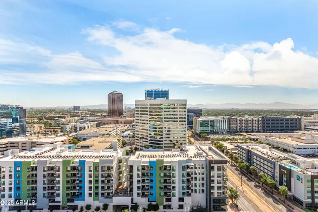 a view of a city with tall buildings