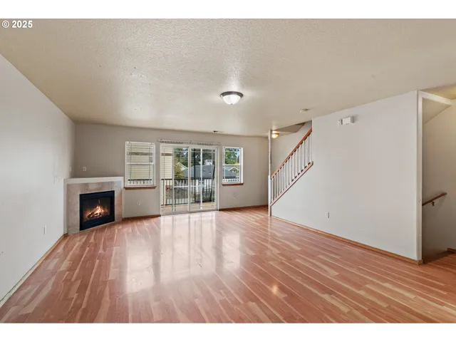 a view of a livingroom with wooden floor
