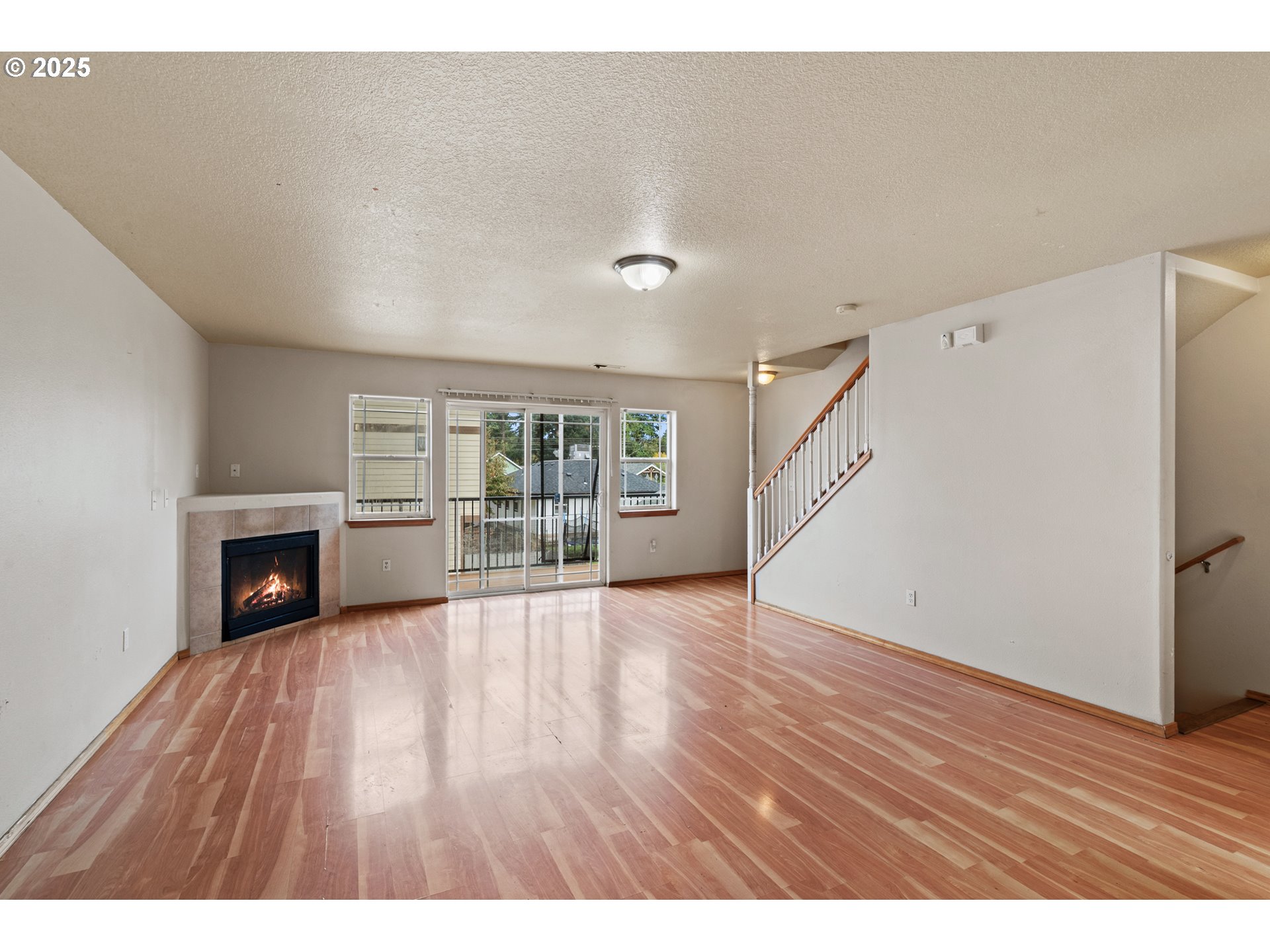 2518 Southeast 130th Avenue, Unit 5 Portland, OR 97236 - Photo 4 of 13 a view of a livingroom with wooden floor