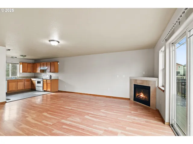 a view of a livingroom with furniture and a fireplace