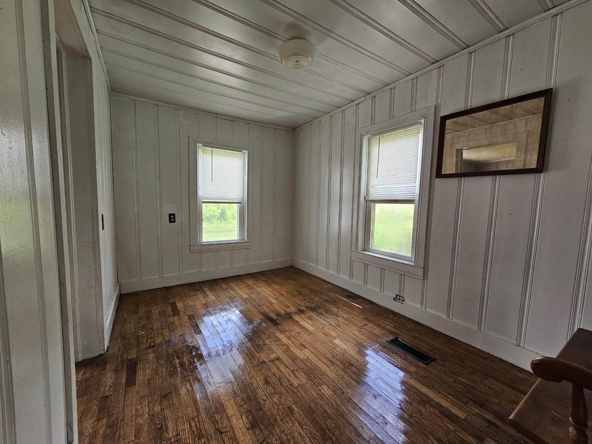 2783 No Pone Road Northwest Georgetown, TN 37336 - Photo 16 of 22 a view of an empty room with wooden floor and a window