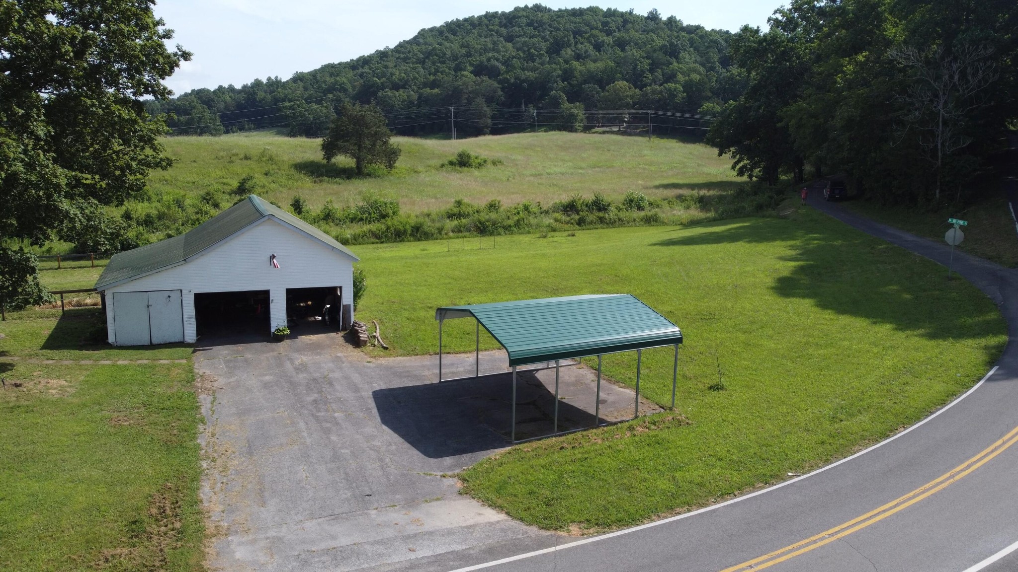 2783 No Pone Road Northwest Georgetown, TN 37336 - Photo 21 of 22 a view of a back yard of the house with a yard