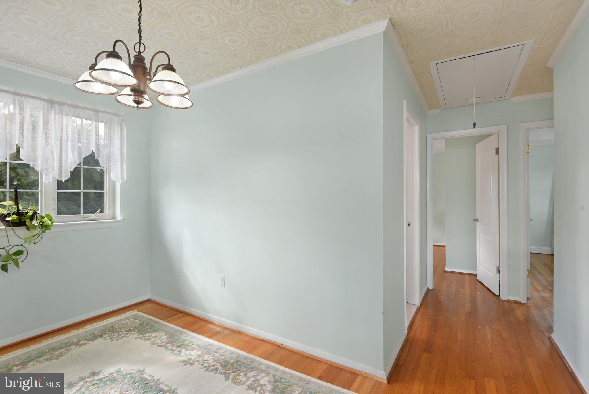 9641 Dundawan Road Baltimore, MD 21236 - Photo 11 of 37 a view of livingroom with hardwood floor and window