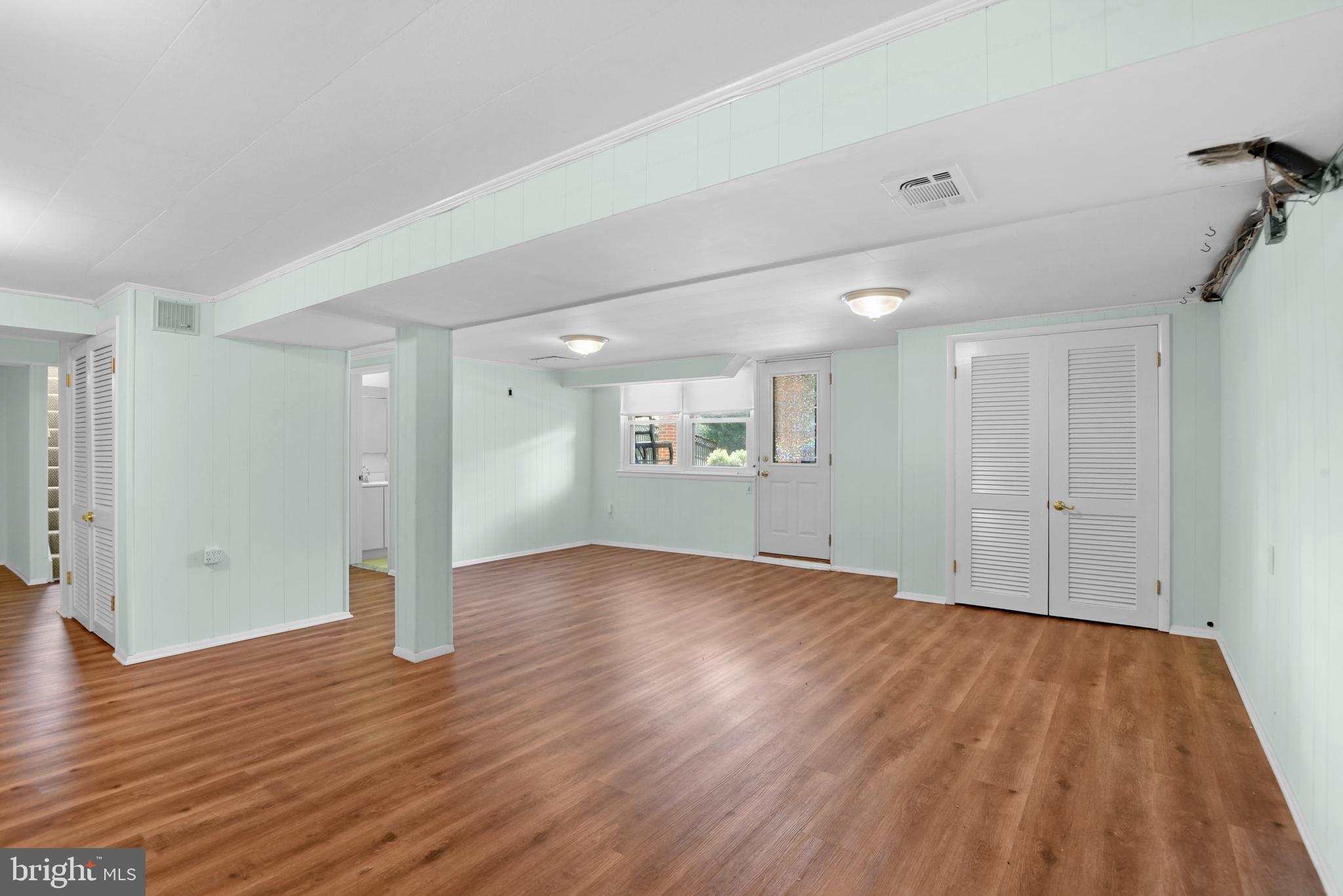 9641 Dundawan Road Baltimore, MD 21236 - Photo 25 of 37 a view of an empty room and wooden floor