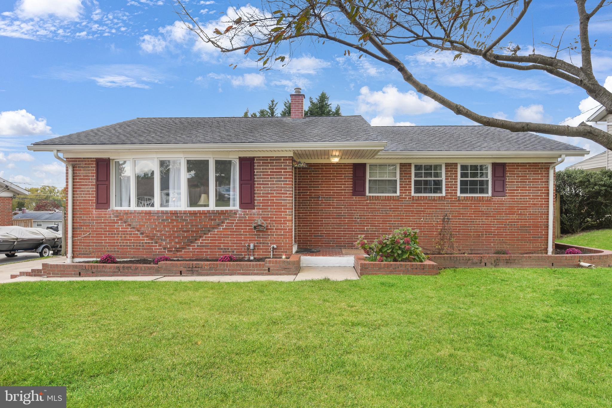 9641 Dundawan Road Baltimore, MD 21236 - Photo 29 of 37 a front view of a house with garden