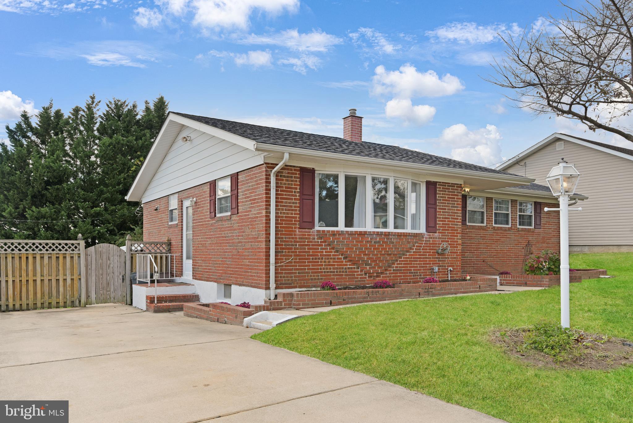 9641 Dundawan Road Baltimore, MD 21236 - Photo 30 of 37 front view of a house with a yard