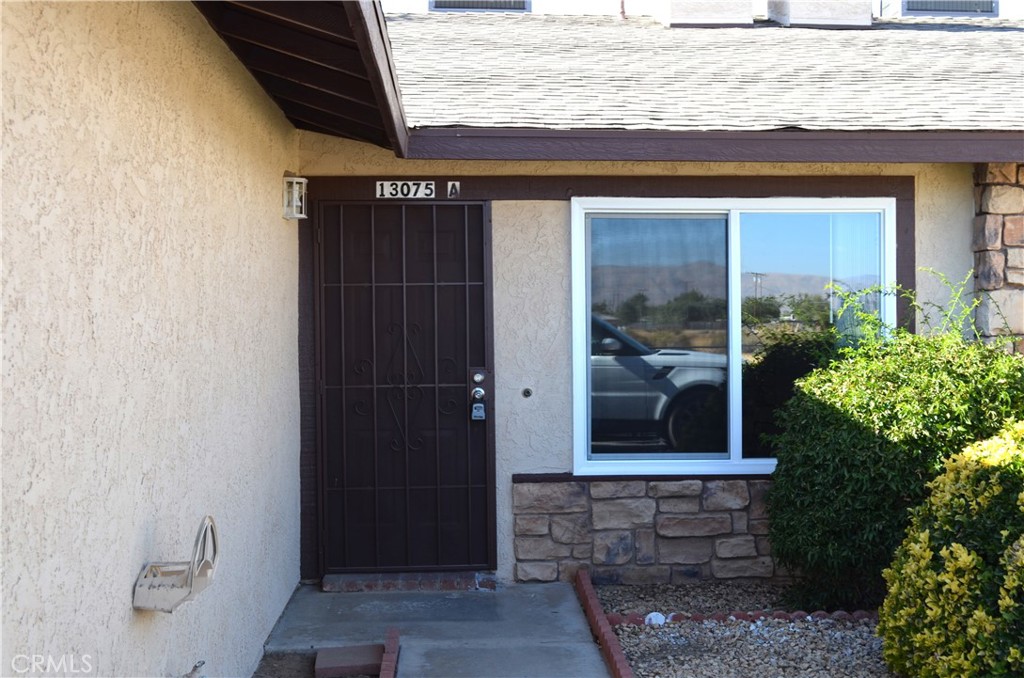 13075 Navajo Road, Unit A Apple Valley, CA 92308 - Photo 1 of 1 a view of house with wooden floor