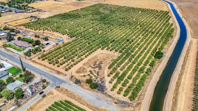 a view of a swimming pool with an ocean view