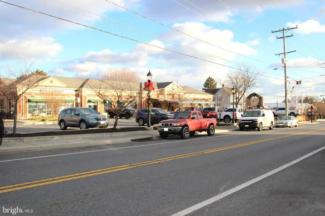 a view of a city street with cars