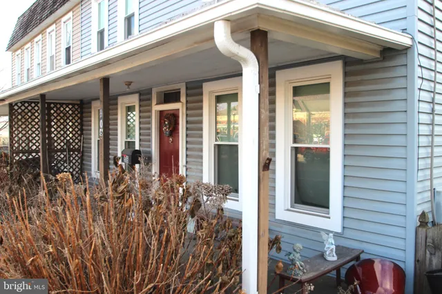 front view of a house with a small porch
