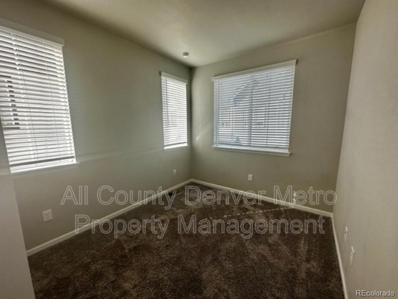 19580 West 92nd Drive, Unit E Arvada, CO 80007 - Photo 16 of 25 a bathroom with a bathtub