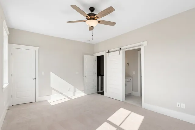 a bathroom with a sink a mirror and a toilet