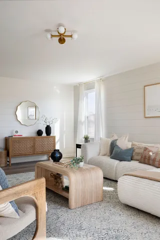 a bathroom with a double vanity sink and mirror