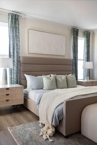 a kitchen with granite countertop white cabinets white stainless steel appliances and refrigerator