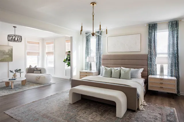 a view of a workspace with furniture and a potted plant