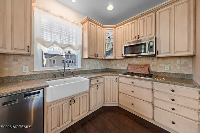 a room with furniture and wooden floor