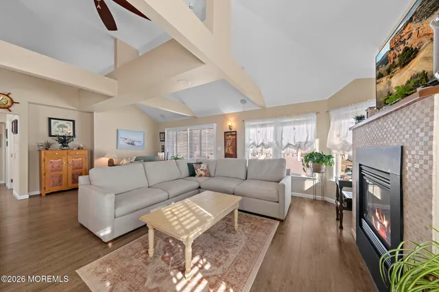 a bathroom with a shower and a sink