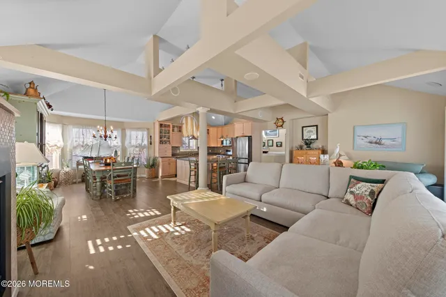 a spacious bedroom with a bed and window