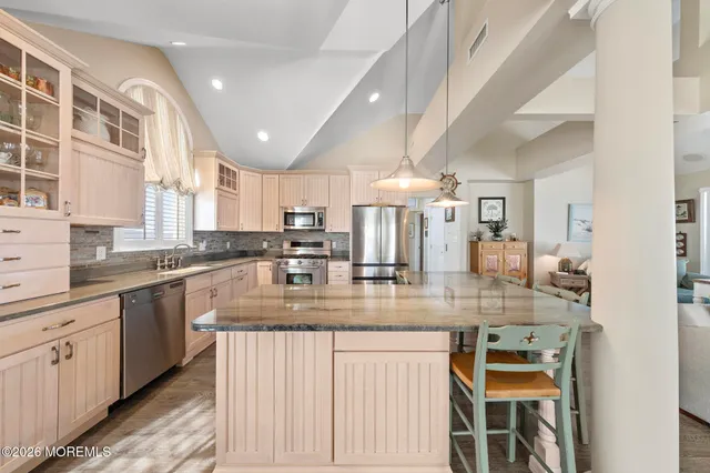 a view of a balcony chairs and wooden floor