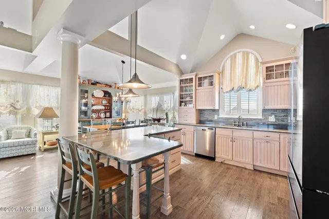 a view of a lake with tall buildings