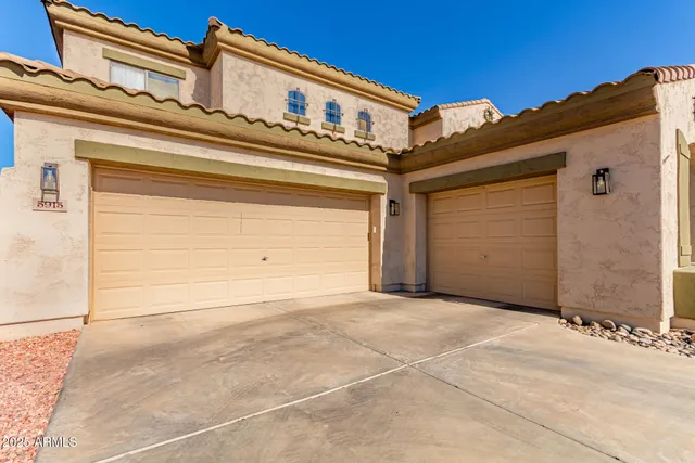 a living room with furniture dining table and a large window