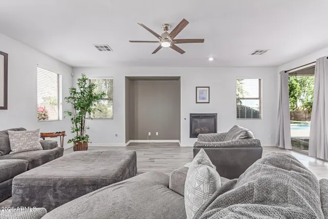 a kitchen with a stove a sink and cabinets