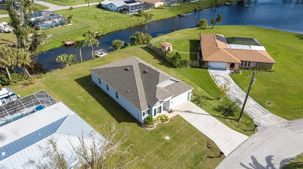 an aerial view of a house with a garden