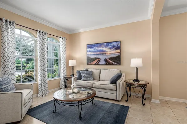 a view of a livingroom with furniture and windows
