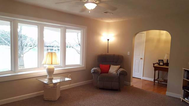 5115 Bethlehem Road Boones Mill, VA 24065 - Photo 12 of 42 a living room with furniture and wooden floor