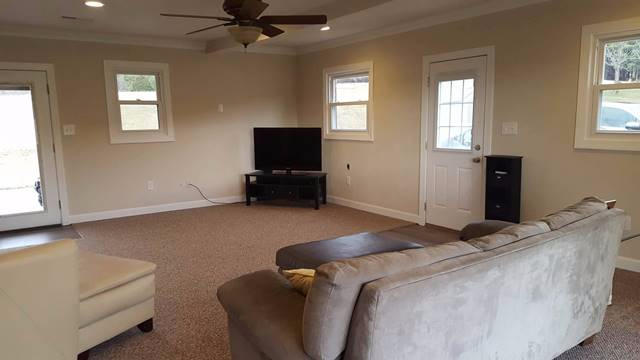 5115 Bethlehem Road Boones Mill, VA 24065 - Photo 13 of 42 a bedroom with a bed and a television