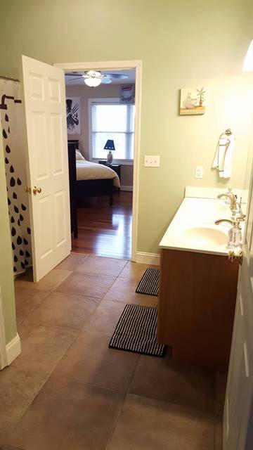 5115 Bethlehem Road Boones Mill, VA 24065 - Photo 27 of 42 a en suite bathroom with a sink and a mirror