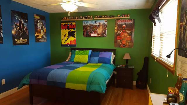 5115 Bethlehem Road Boones Mill, VA 24065 - Photo 31 of 42 a bedroom with a bed and a painting on the wall