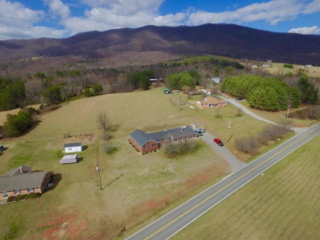 5115 Bethlehem Road Boones Mill, VA 24065 - Photo 34 of 42 a view of a pool with a yard