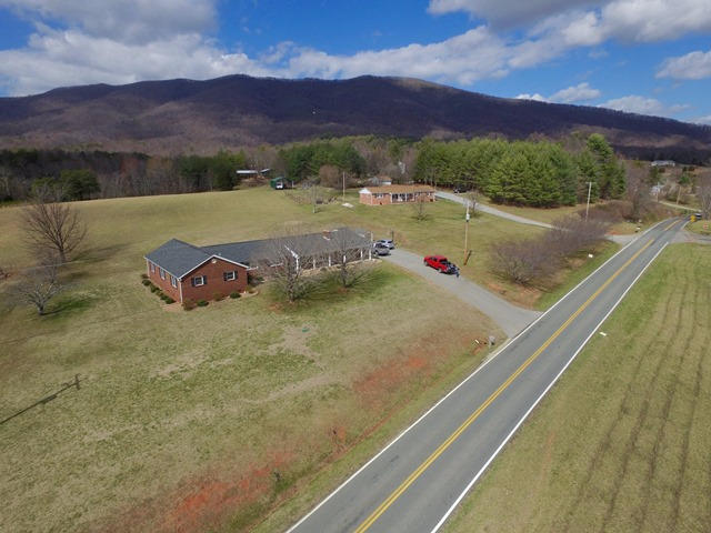 5115 Bethlehem Road Boones Mill, VA 24065 - Photo 6 of 42 a view of a terrace with a yard
