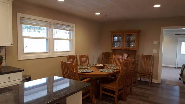 5115 Bethlehem Road Boones Mill, VA 24065 - Photo 8 of 42 a view of a dining room with furniture and wooden floor