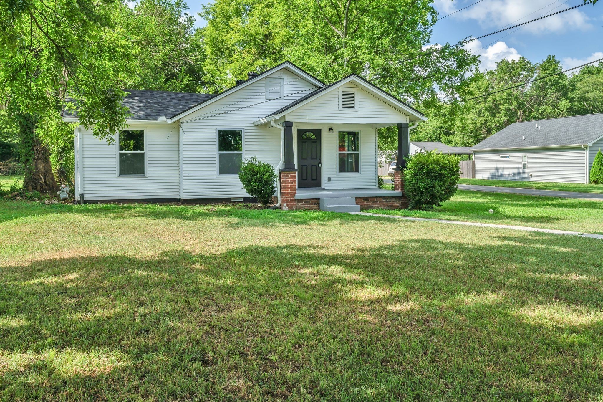 302 Maple Street Madison, TN 37115 - Photo 1 of 33 a view of a house with a yard