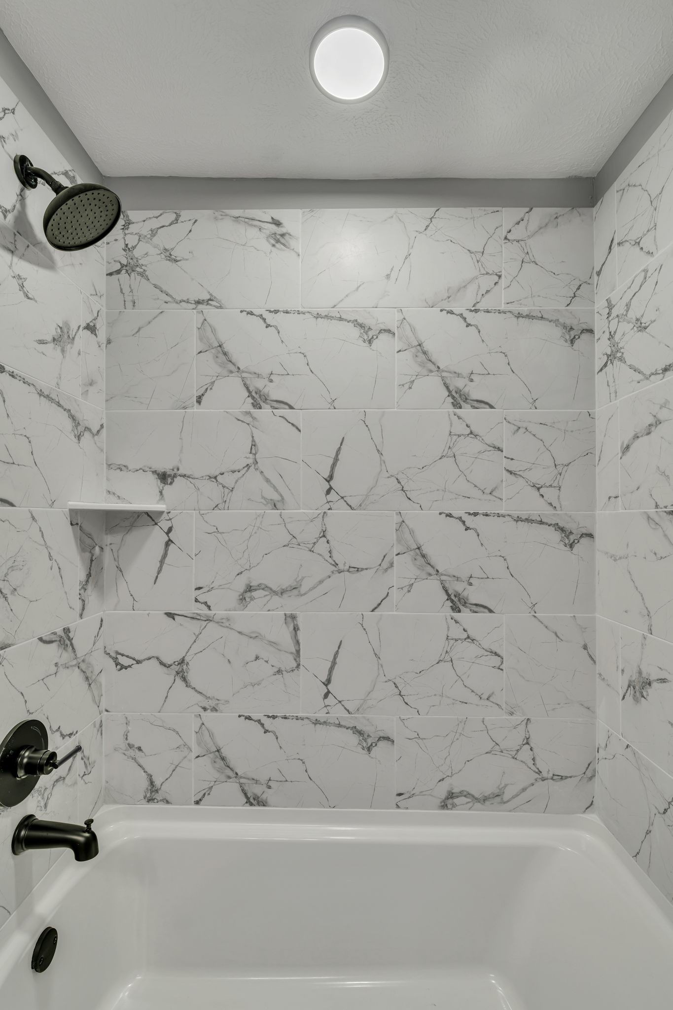 302 Maple Street Madison, TN 37115 - Photo 18 of 33 a bathroom with a bathtub