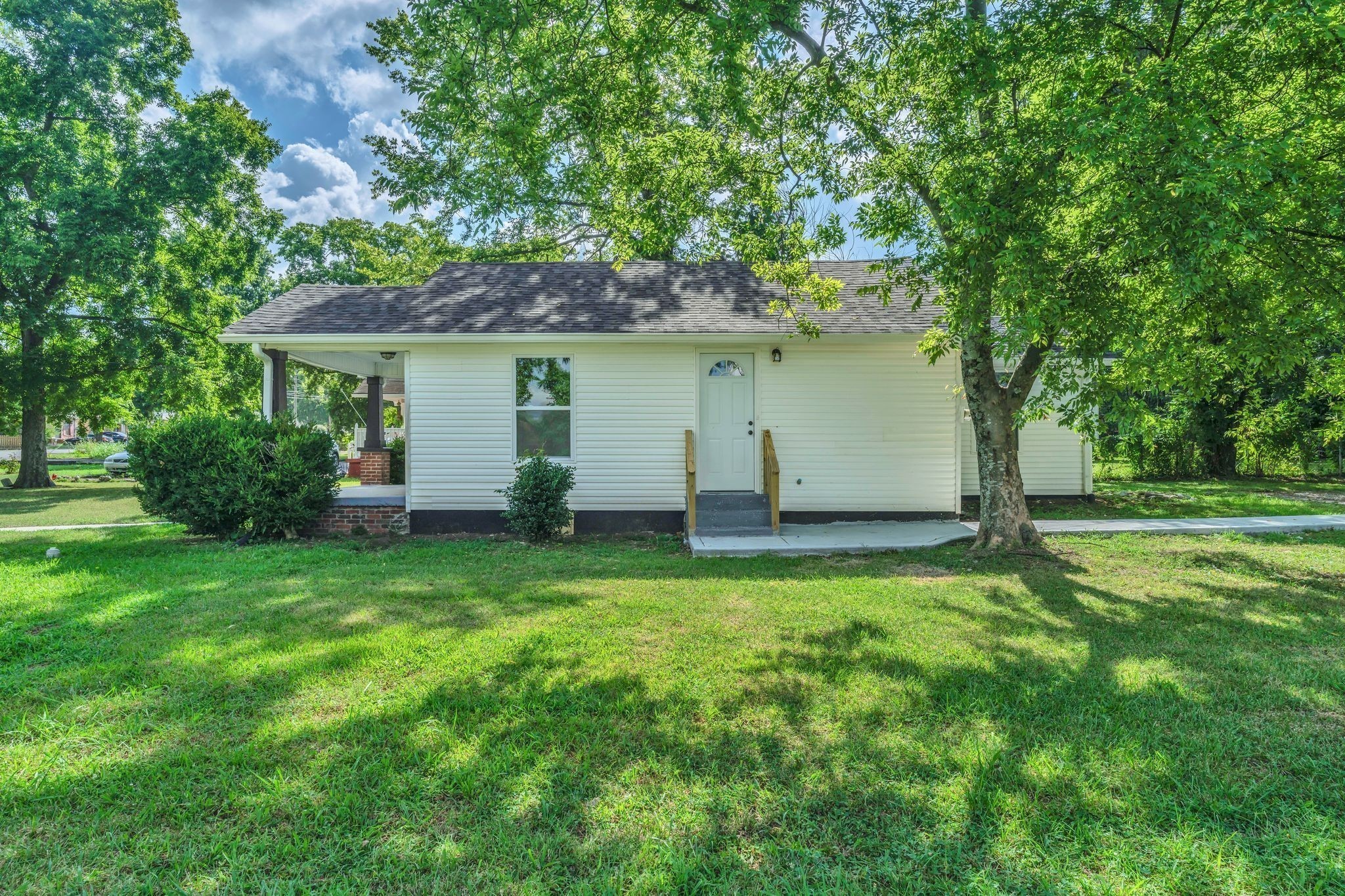 302 Maple Street Madison, TN 37115 - Photo 29 of 33 a view of a house with a backyard