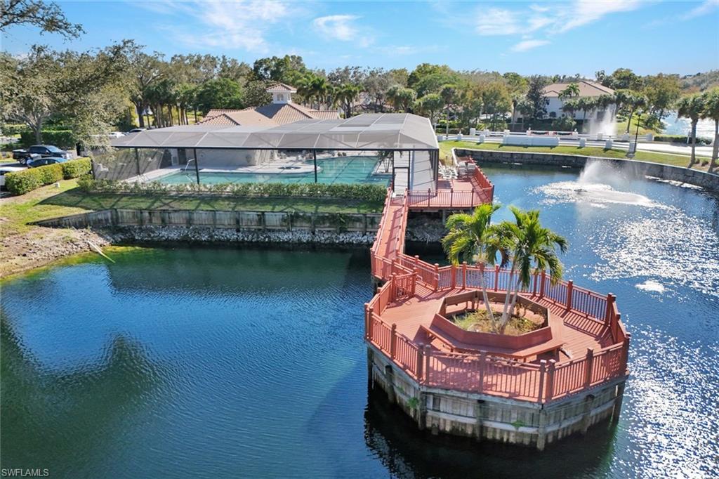 6883 Redbay Park Road, Unit 102 Naples, FL 34109 - Photo 19 of 22 an aerial view of a house with outdoor space lake view and lake view