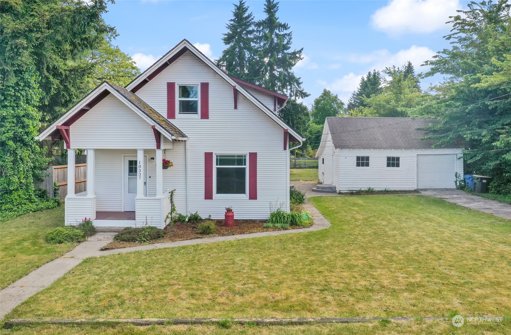 10337 184th Avenue Southwest Rochester, WA 98579 - Photo 1 of 32 a front view of house with yard and trees
