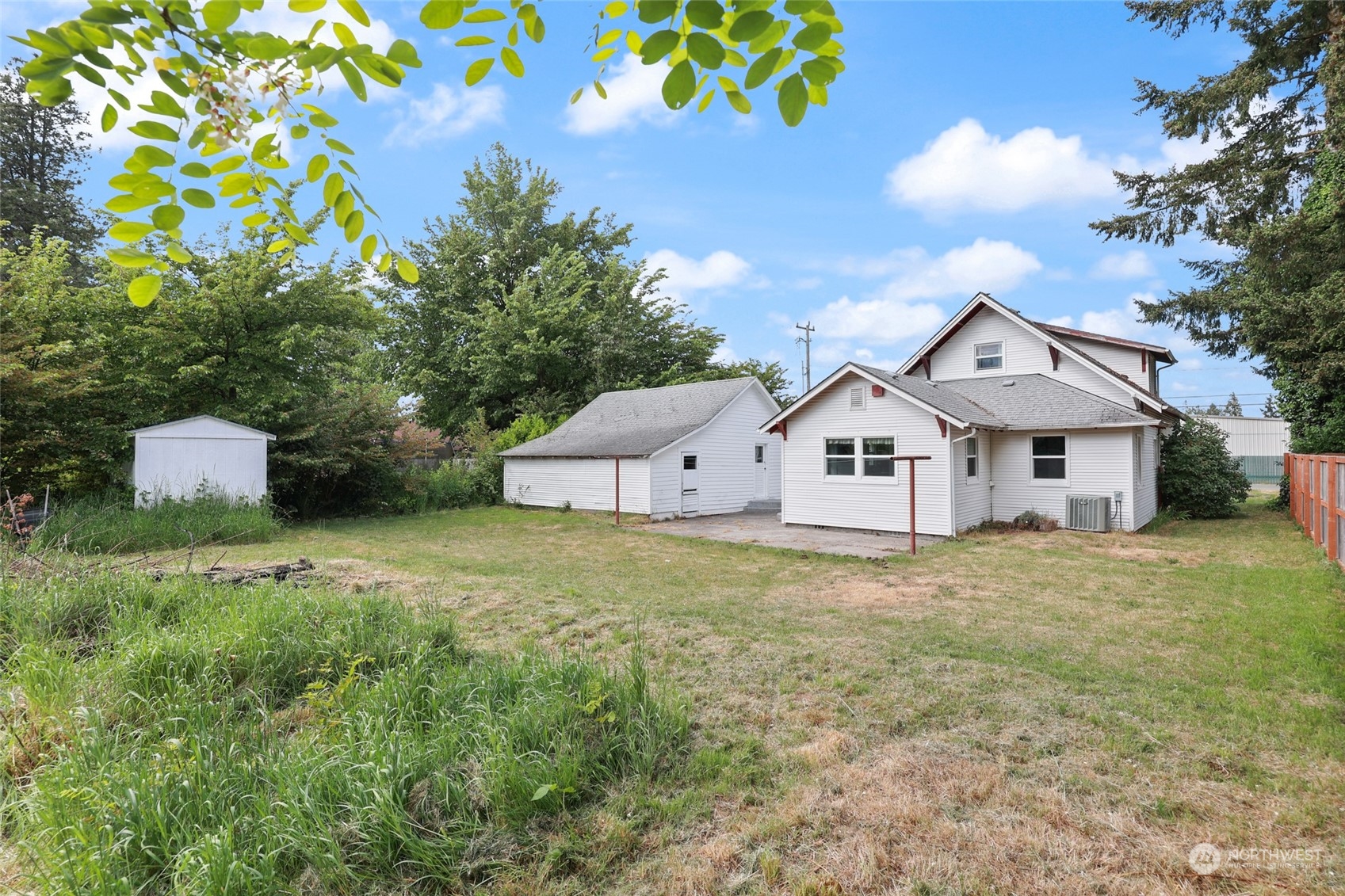 10337 184th Avenue Southwest Rochester, WA 98579 - Photo 29 of 32 a view of a house with a yard and a garden