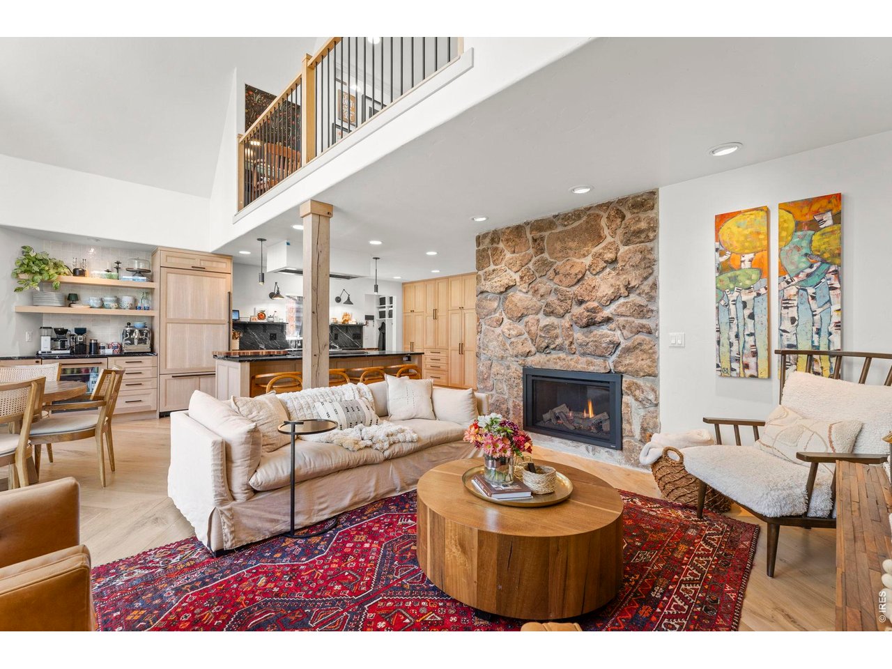 770 North Cedar Brook Road Boulder, CO 80304 - Photo 16 of 50 Open-concept living centered around a stunning stone fireplace